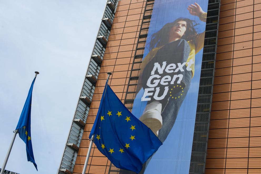 The banner NextGenerationEU on the front of the Berlaymont building